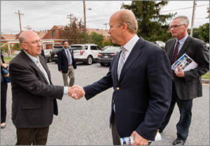 image of Dr. Reynolds and Congressman Delaney shaking hands