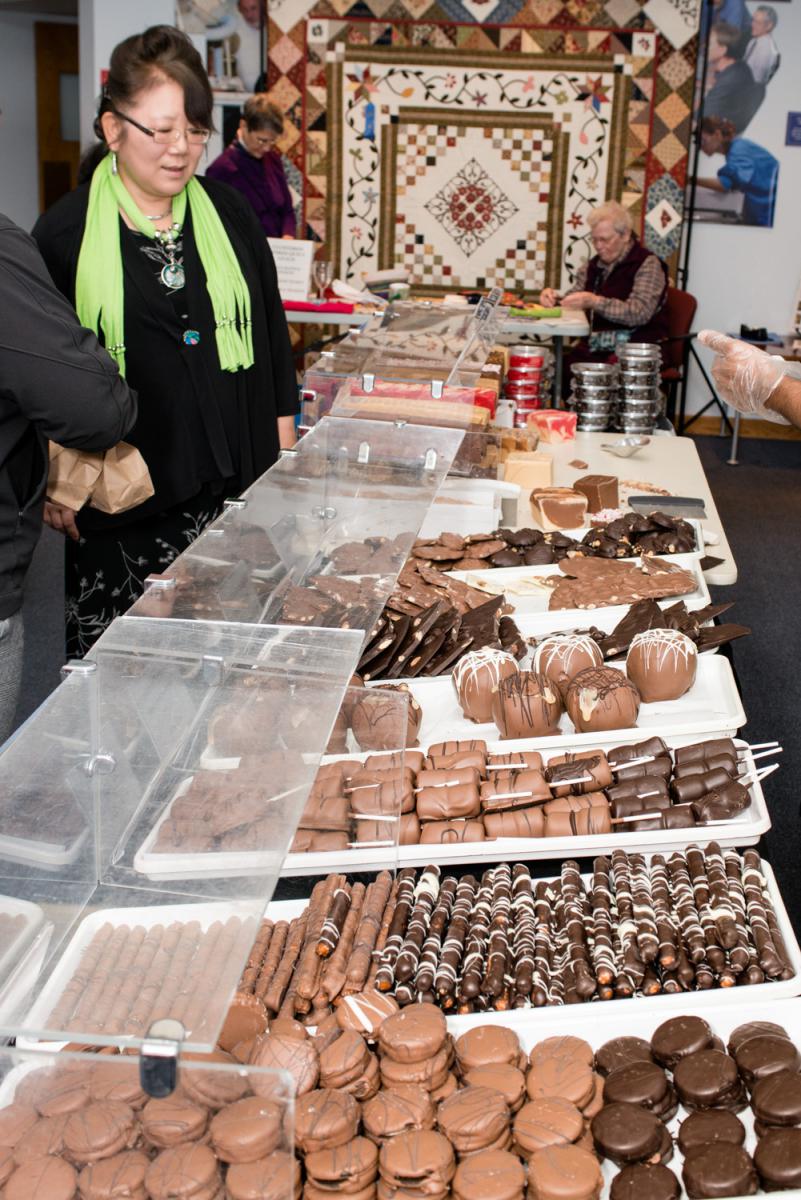 An array of desserts for sale at the market