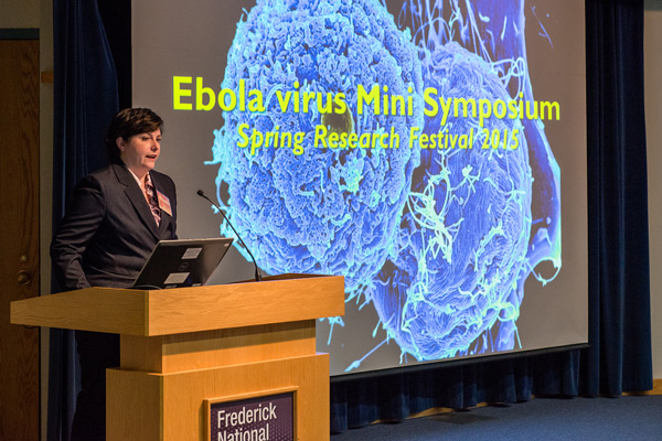Vicki Jensen, National Biodefense Analysis and Countermeasures Center, providing opening remarks at the Ebola Virus Mini Symposium, sponsored by the National Interagency Confederation for Biological Research, held May 5.