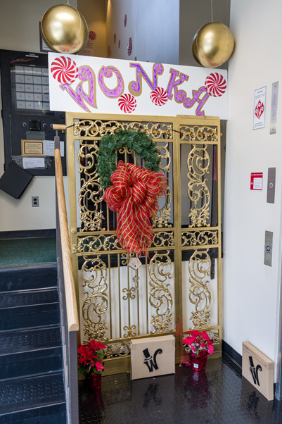 The gate to Willy Wonka’s chocolate factory in the Building 430 foyer. (Photo by Samuel Lopez)