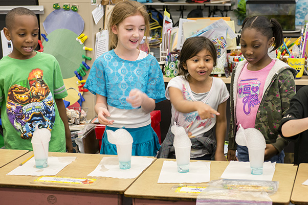 Local elementary schoolers excitedly watch their projects during an Elementary Outreach Program activity. (Photo by Richard Frederickson, staff photographer)
