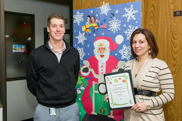 Second place, Most Festive Individual Door, was awarded to Scott Keasey and Erin Gagnon, for “Biker Santa.” 
