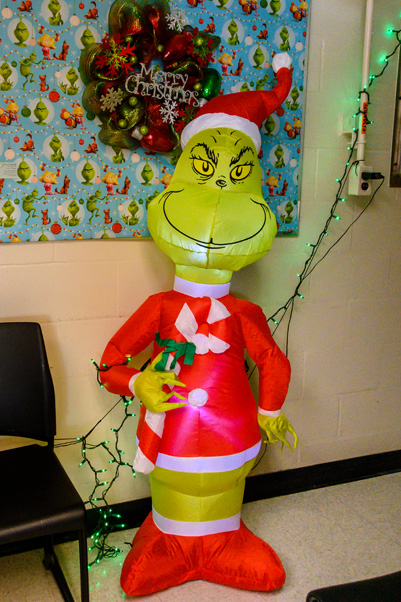 The Grinch glares across Building 571’s breakroom as part of the “The Grinch That Stole Christmas”