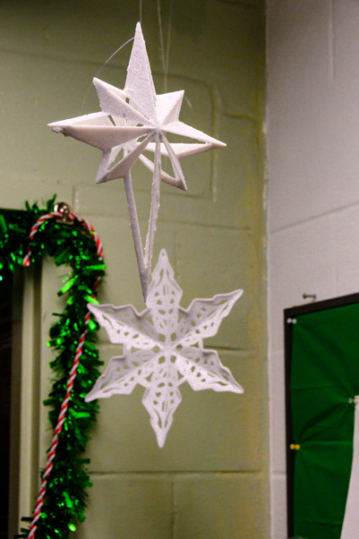 Several strands of snowflakes were hung in the Building 571 entryway