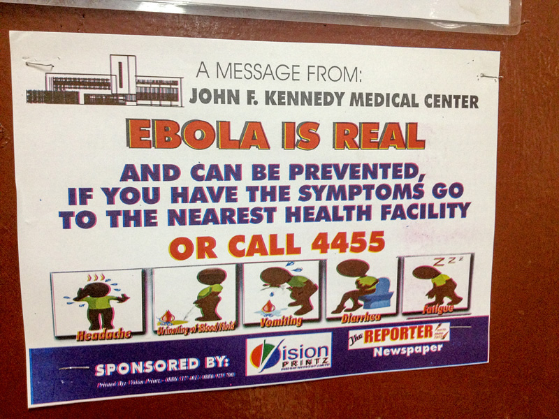 Signs are posted throughout the city of Monrovia, Liberia, about the symptoms of Ebola, how it is transmitted, and what to do in case of infection. Photo courtesy of Beth Baseler, CMRP.