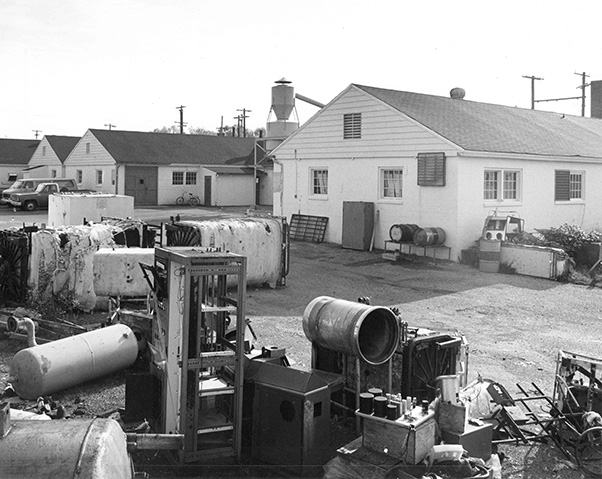 Scrap metal piled near the machine shops in the early 1970s. (Office of NIH History and Stetten Museum)