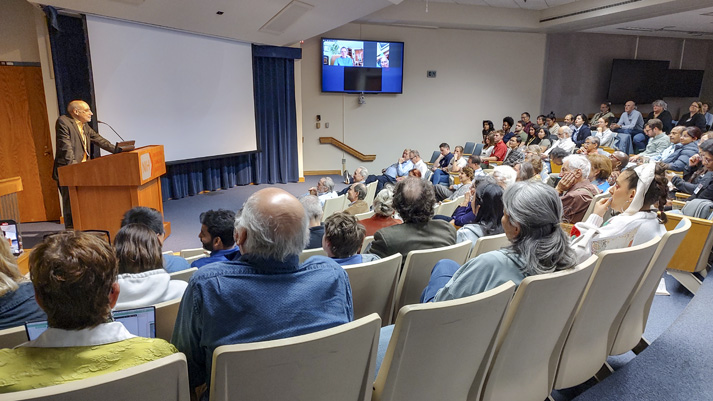 Rein introduces speaker Françoise Barré-Sinoussi, who joined the festivities from her home in France via webcam. (Photo by Samuel Lopez)