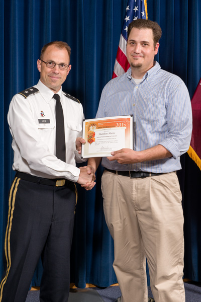 Matthew Harris accepts certificate from Maj. Gen. Brian Lein, commanding general, USAMRMC, for Outstanding Poster, Structural Biology and Chemistry.