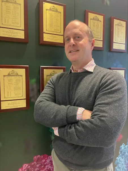 Stephan Stern, Ph.D., stands with his plaque on the patent wall. (Photo credit: Stephan Stern)