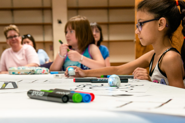 Building 430 hosted the popular “Ozobots and OzoCode Introduction,” where children could learn how to program a handheld robot.