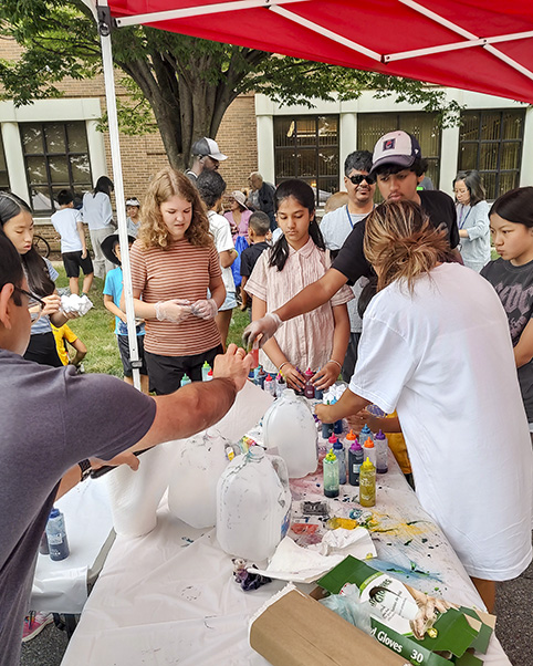 Arguably one of the biggest hits of the day, the “Tie-Dye Swag” station, shown here, had a crowd for most of the morning. Unlike typical tie-dye, the activity used markers and rubbing alcohol to create a tie-dye effect—and teach kids some scientific principles along the way.