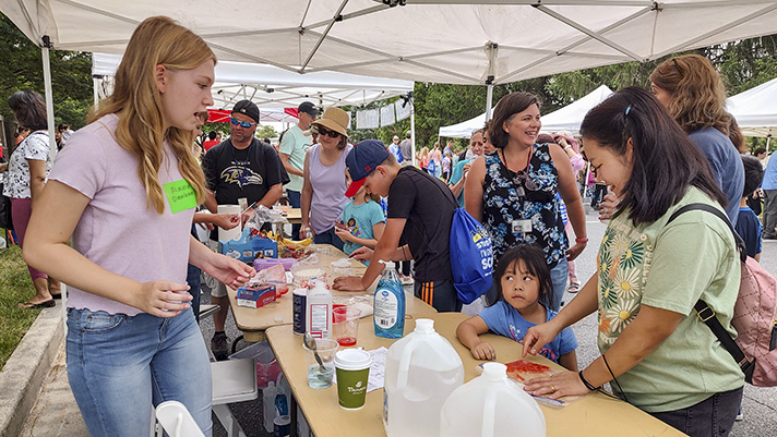 At the hub was another old favorite making its return this year. By using common household materials, kids extracted DNA from strawberries and got to take the fruits of their labor home with them.