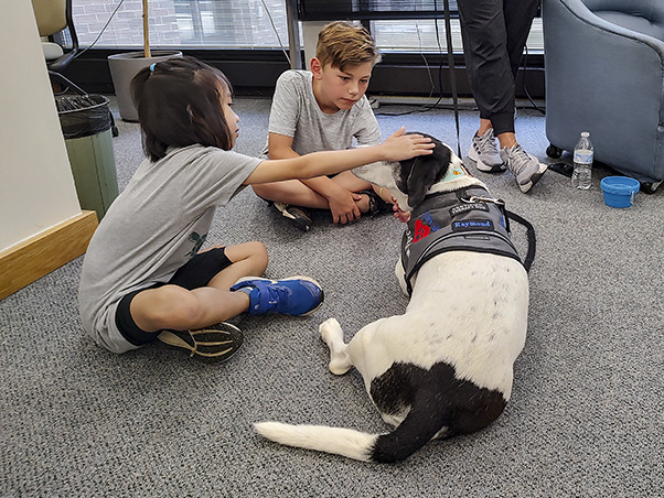 To the delight of many, the R.E.A.D. therapy dogs also made a comeback at the Scientific Library this year, adding a bit of four-legged fun to the day.