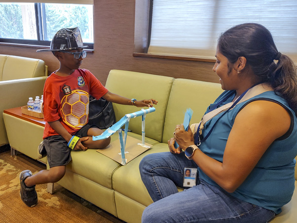 In the “Rollercoaster of Energy” program, kids engineered their own miniature rollercoaster for a marble, built catapults to launch marshmallows, and learned some physics while they were at it.