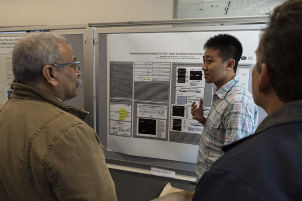 Richard Ma (center-right) advised interns who are first-time presenters to “just keep doing what they’re doing in the lab,” “perform the experiments as best they can,” and take chances “to do some studying on the side.” He believes that doing all three helped him prepare for his presentation.