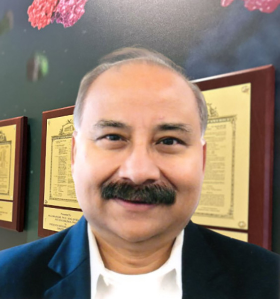 Apurva Srivastava, Ph.D., stands by his plaque on the patent wall. (Photo credit: Apurva Srivastava)