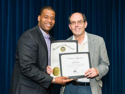 Howard Young receives an award.