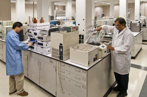 Two men in a laboratory.