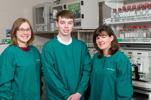 Alex Beall, with mentors (from left) Stephanie Mellott and Nicole Shrader.