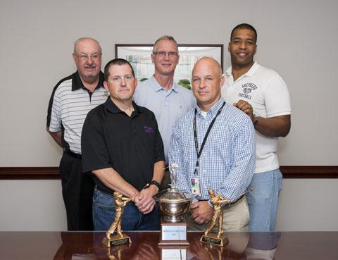 A group photo with the Defelice Cup trophy