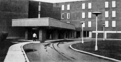 Black-and-white photo of a hospital entrance