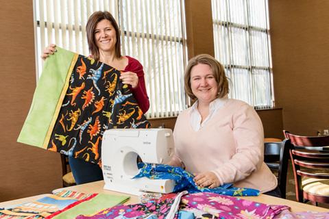 Two women with pillowcases