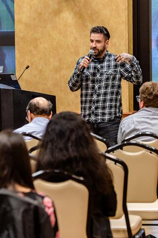 A person speaking to an audience