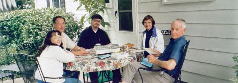 Group of people sitting around a table