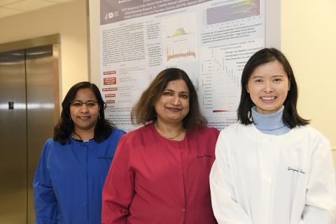 Photograph of Jyoti Shetty, Monika Mehta, and Yongmei Zhao in the Sequencing Facility.