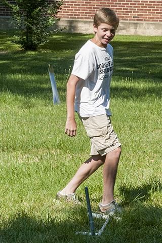 Photo of a child firing a toy rocket at Take Your Child to Work Day 2017