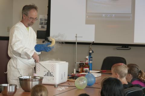 Take Your Child to Work Day event involving dry ice and a blowtorch.