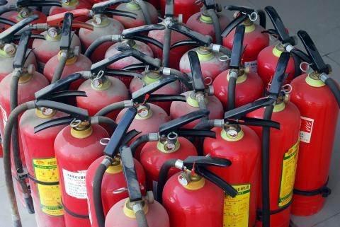 A collection of fire extinguishers.