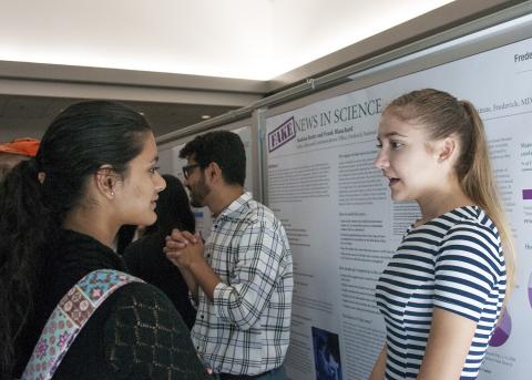 Students interact at the 2017 Student Poster Day event.