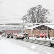 cars leaving Fort Detrick in a snow storm