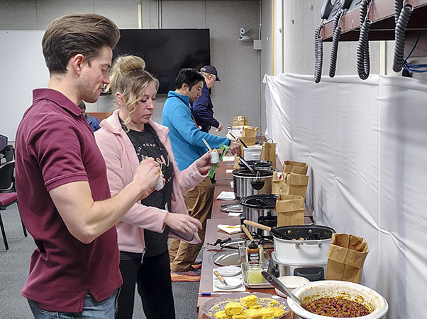 Devin Abshire and Ashley Miller (both foreground) sample the array of tough choices this year.