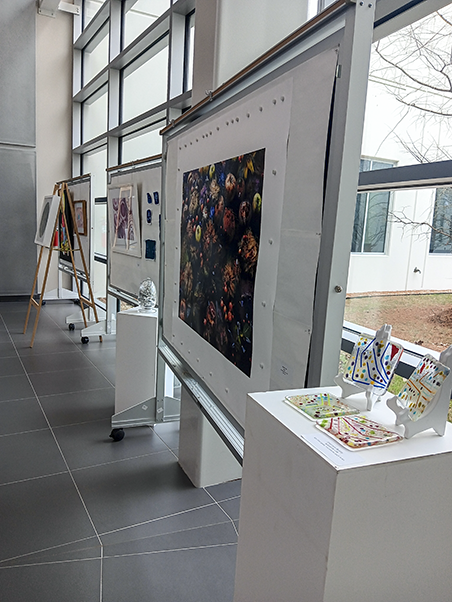 Other pieces in the exhibit depicted science through various media. (Photo by Victoria Brun.)