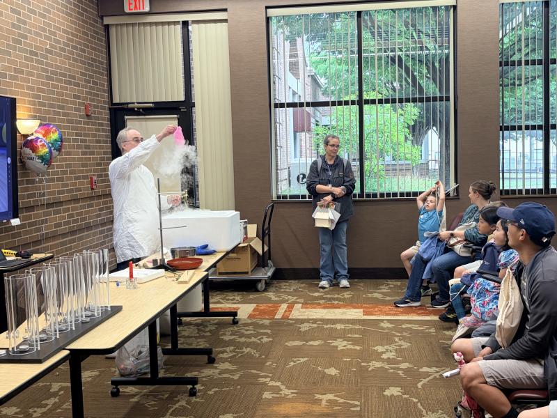 A dry ice trick captivates the crowd at the popular annual “Fire and Ice” demonstration. Image credit: Karolina Wilk