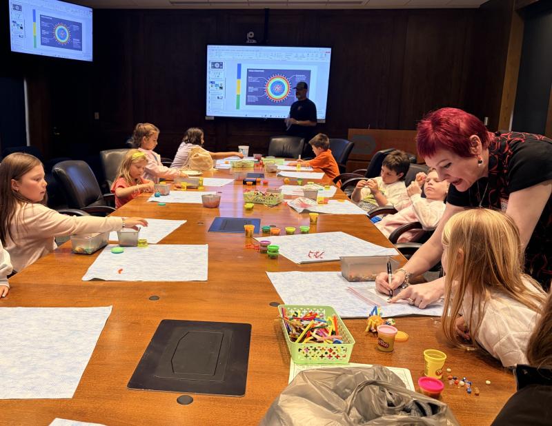 Kids craft their own virus particle model with the help of some volunteers. Image credit: Karolina Wilk