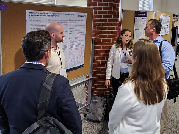 A poster session rounded out the symposium’s second day, offering another exchange of ideas after the working group sessions. (Photo by Samuel Lopez)