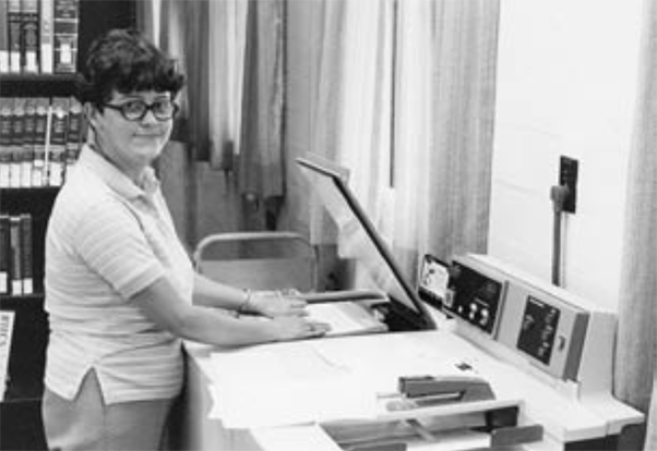 Darlene Clements, a former Scientific Library employee, working in the library, c.1970s. (Photo from the SPGM archive.)