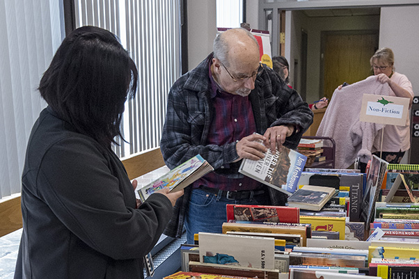 The Book and Media Swap continued through 2019 (shown here), paused during the worst of the COVID-19 pandemic, then briefly returned a few years later. (Photo from the SPGM archive.)